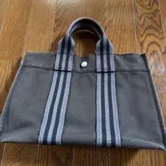 HERMES エルメスフールトゥMM キャンバストート グレー×オレン - メルカリ
