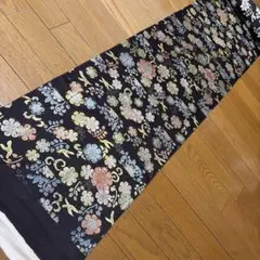 西陣織九寸帯未仕立品 弥栄織物墨黒地縦花蔓文 芯入仕立代込み - メルカリ