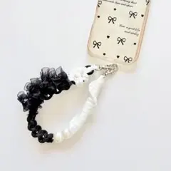 モノトーン スマホハンドストラップ ホワイト×ブラック フリル 花 パラコード