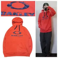OAKLEYパーカービッグロゴプリントオレンジスノボーストリートy2k00s