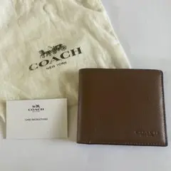 COACH 二つ折り財布　カードケース　袋付きのサムネイル
