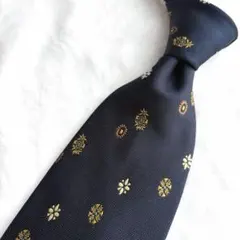 ジュンコシマダ メンズ ネクタイ 紺 金 幾何学模様 花柄 小紋柄 モチーフ 絹のサムネイル