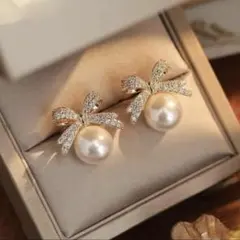 パール リボン ピアス ゴールド　上品 大人可愛い フェミニン