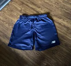 ニューバランス　サッカーショートパンツ　練習着　紺色　Lサイズのサムネイル
