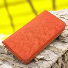 訳アリ 高級感溢れる波紋型押し オレンジ長財布 滑らかファスナー
