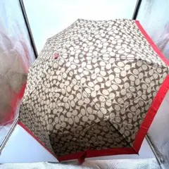 コーチ　シグネチャー　折り畳み傘　ワンタッチ式　0823001
