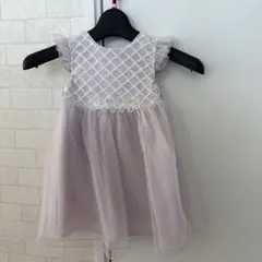 プティマイン 淡い紫色のフリル袖ワンピース