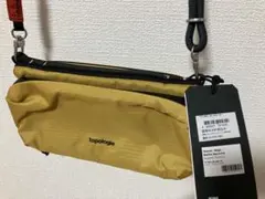 topologie ボトルサコッシュ マスタードイエロー