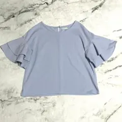 アースミュージックアンドエコロジー　ブラウス フリル 半袖　ブルー F