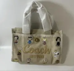 コーチ　coach COACH カーゴトート　ピーナッツ　スヌーピー　ベージュのサムネイル