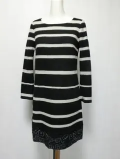 GRACE グレースコンチネンタル　裾にビーズやスパンコールの付いたワンピース