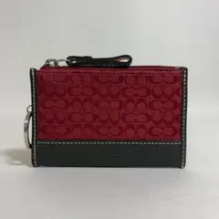 2510-153｜コーチ ミニシグネチャー フラグメントケース ダークブラウン