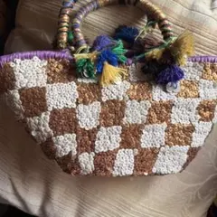 タマオワールド カラフルぽんぽんカゴバッグ - メルカリ