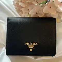 PRADA 二つ折り財布 サフィアーノ バイカラー ブラック ピンク 訳ありのサムネイル