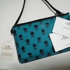 新品コーチポーチストラップ付　花柄