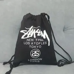 週末限定価格Stussy ドローストリングバッグ ブラックのサムネイル