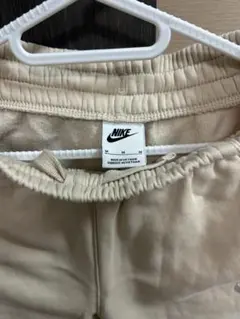 Nike ベージュ パンツ M