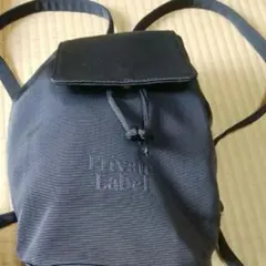 Private Label 刺繍ロゴ入り黒のリュック型ショルダーバッグ