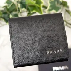 美品✨】PRADA SPAZZOLATO TRIA ブラッシュドレザー 財布 - メルカリ