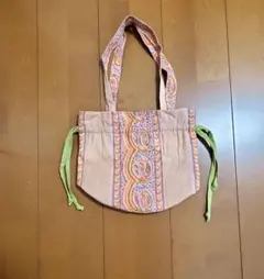 TITICACA 【新品】ピンクオレンジ系 柄入りコットン巾着バッグのサムネイル