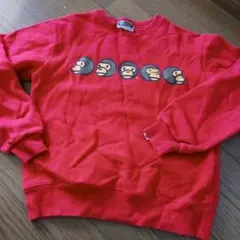 猿プリント赤トレーナー M