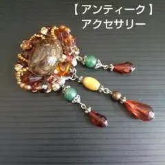 アンティーク調の金色のバラの装飾が施された針山（使用感あり