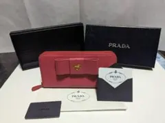 プラダ リボン ラウンドファスナー長財布レザー ピンク 1ML506