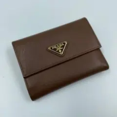 □未使用級□ PRADA 三角プレート　財布　　がま口　レザー　ブラウン □未使用級□ PRADA 三角プレート 財布 がま口 レザー ブラウン - メルカリ