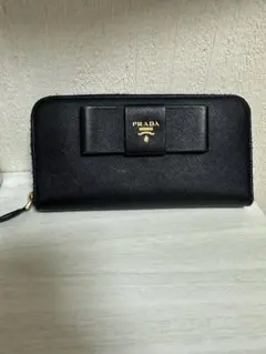 早い物勝ち！・極美品】PRADA サフィアーノレザー 長財布 リボン