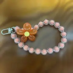 花型オレンジピンクスマホストラップ
