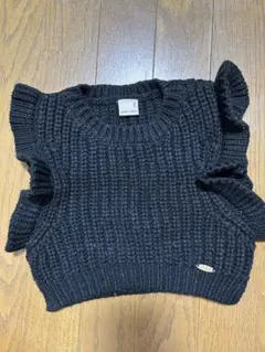 petit main フリル付き黒ニットセーター