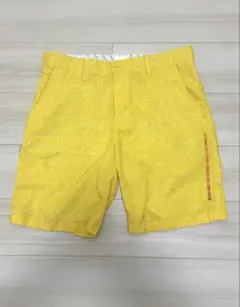 New Balance Golf ショートパンツ イエロー ロゴ柄のサムネイル