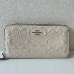 COACH 長財布 ラウンドファスナー エンボス シグネチャー