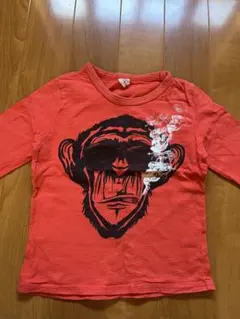 オレンジ 猿の顔 長袖Tシャツ INDIE JUNGLE