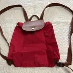 赤いナイロンリュック・フラップ付き