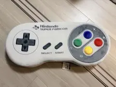 ニンテンドーミュージアム限定 スーパーファミコンコントローラー タグ付き 任天堂ミュージアム限定スーパーファミコンコントローラークッション
