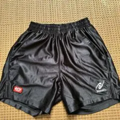 Nittaku ブラックショートパンツ JTTAロゴ付き