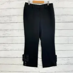 美品 トゥービーシック 裾 リボン クロップド パンツ 黒 トリアセテートのサムネイル