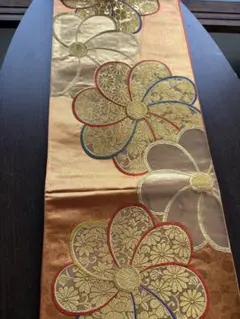 アンティーク袋帯☆お1オレンジゴールドに唐草や花の浮き出しベースに大輪の花
