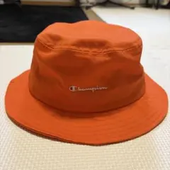 Champion バケットハット オレンジ 星条旗ロゴのサムネイル