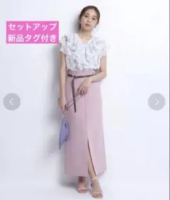 JUSGLITTYプチハートボウタイブラウスとエスカルゴスカート