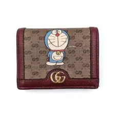 GUCCI 2つ折り 財布 ドラえもん インターロッキング PVC GG - メルカリ