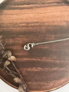 リボンとハート型クリスタルツイストペンダント