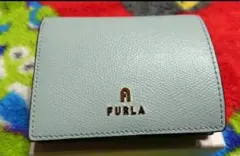 FURLA 二つ折り財布 ライトブルー レディース カメリア WP00304