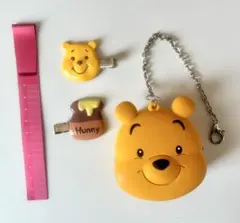 くまのプーさん　プーさんフェイスのシリコン小物入れ(チェーン付)ヘアクリップ付き