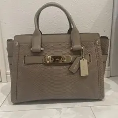 COACH ベージュ ヘビ柄 バッグ