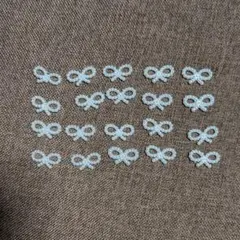 白色リボン型ネイルパーツ20個セットと花の種