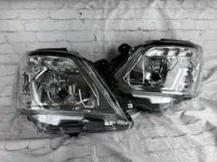 新品 NV350キャラバンE26後期 オートレベライザーヘッドライト 純正 