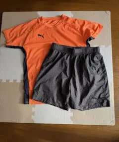 PUMA オレンジシャツと黒ショートパンツセット