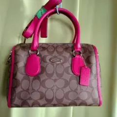 COACH ショルダーバッグ シグネチャーショルダーベルト付きブラウン/ピンク